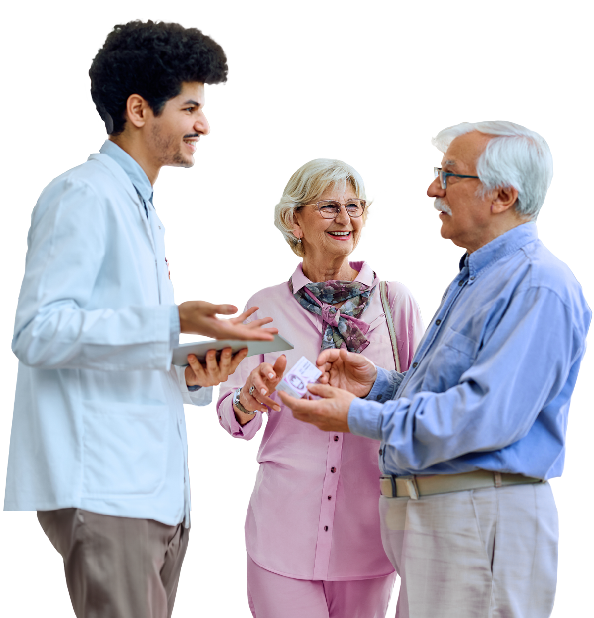 Pharmacist conversing with elderly couple